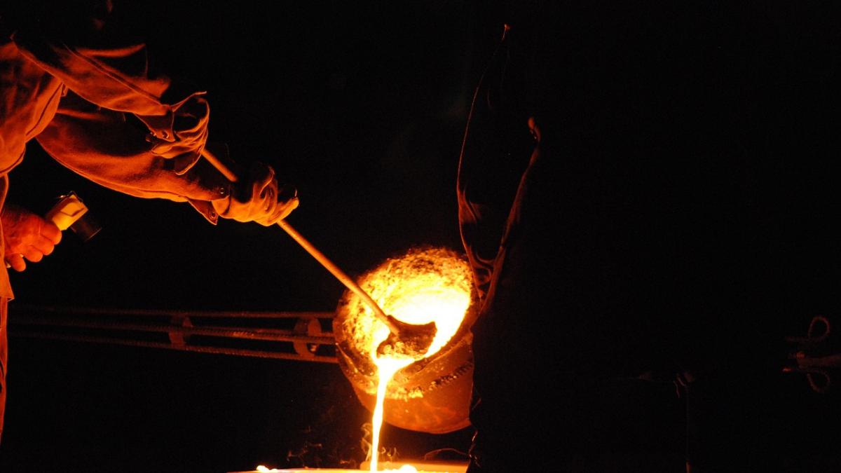 Pouring Molten Metal in Precision Casting