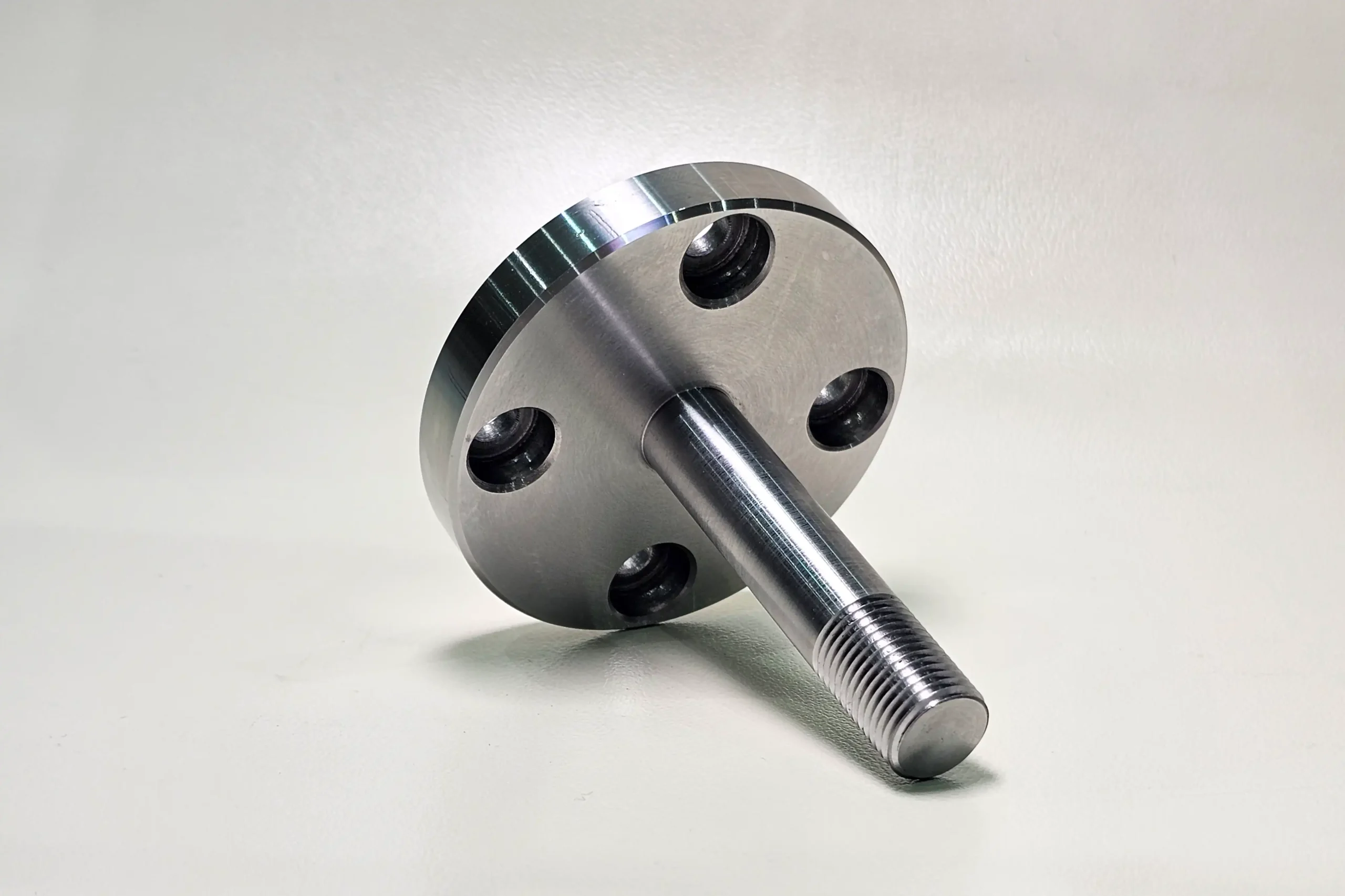 CNC machined stainless steel flanged shaft with threaded end
